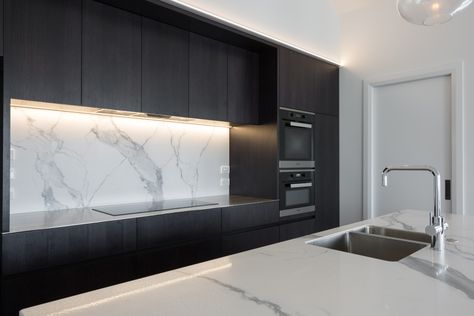 Porcelain vs Dekton: Which is the Best Benchtop? While researching the pros and cons of both Porcelain and Dekton, one thing is quite apparent. They are remarkably similar in their robust durability as a benchtop material. These comparable qualities often lead to confusion amongst homeowners. Many ... Caesarstone Raw Concrete, Stone Benchtop, Honed Granite, Kitchen Benchtops, External Cladding, Dream Kitchens Design, Kitchen Surfaces, Kitchen Splashback, Stone Kitchen