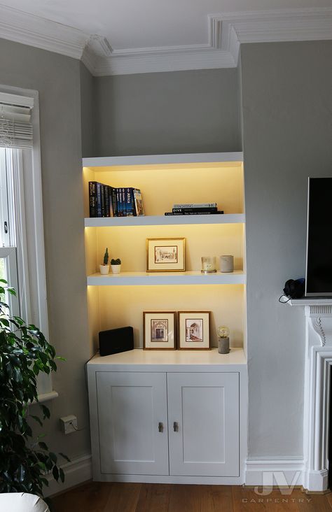 Cupboard And Shelves In Alcove, White Alcove Cupboards, Living Room Built In Storage Ideas, Alcove Shelving With Lights, Shelving For Alcoves Living Rooms, Alcove Lighting Living Room, Alcove Shelving Lighting, Fireplace Alcove Storage, Chimney Alcove Shelves