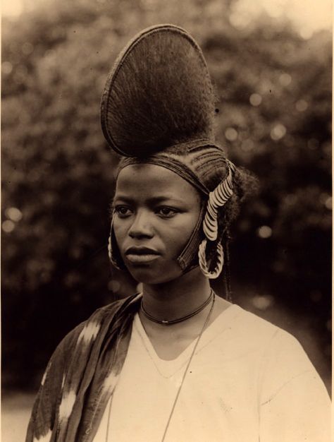 Africa | Fula (Fulani/Fulbe) woman from Guinea. | Vintage postcard; photographer unknown African Civilization, Elaborate Hairstyles, Social Hierarchy, Family Background, Healthy Children, Traditional Hairstyle, Afrikaanse Kunst, History Facts Interesting, Social Status