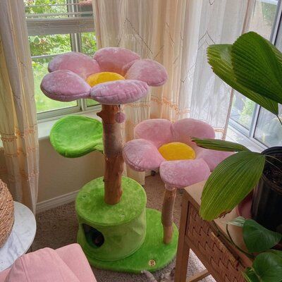 Want a unique cat tree that beautifies your home while giving your cat a place to rest? This stunning, lifelike Cherry Blossom Cat Tree is the one you are looking for. Inspired by the natural beauty of the Cherry Blossom Tree, this modern floral design is hand-made with real natural, treated wood branches, two cozy cherry blossom-designed flower cat beds, and one leaf design perch. It has an enclosed, private condo on the ground floor and two dangly pom-pom toys attached for playtime fun. ***All Katt Hus, Flower Cat Tree, Katt Grejer, Cat Tree House, Flower Cat, Modern Floral Design, Floral Cat, Cat Condo, Modern Cat