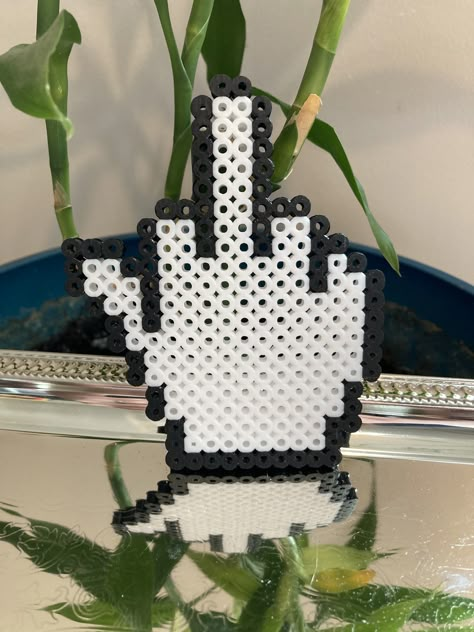 This is a Perler Bead figure of a middle finger computer cursor. It is 4in tall and 3in wide. It is a great funny gift to give to a friend. Can be used in a variety of ways. Can be customized as a keychain, a magnet, or used as the figure itself on display. This would be a good nicknack to place on a computer tower, a shelf, or fridge. Perler Bead Fridge Magnets, Skeleton Perler Bead Patterns, Possum Perler Bead Pattern, Perler Beads Decor, Scream Perler Bead Patterns, Knife Perler Beads, 14x14 Perler Bead Patterns, Adult Perler Bead Patterns, Bts Perler Beads