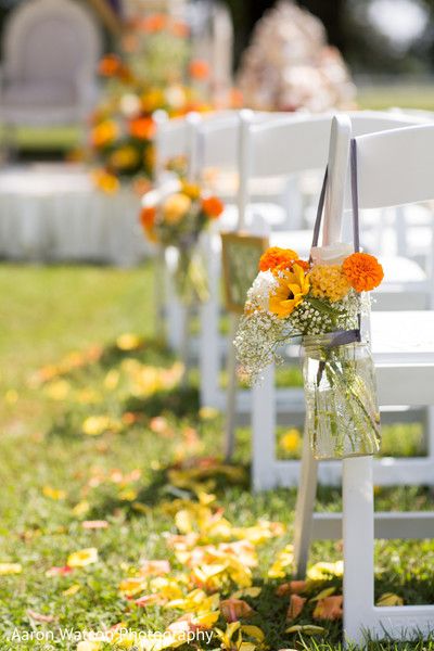 Lovely wedding aisle floral and decor http://www.maharaniweddings.com/gallery/photo/100620 Decorate Isle For Wedding, Outdoor Wedding Aisle Entrance, Simple Fall Wedding Aisle Decor, Mums Down Wedding Aisle, End Of Wedding Aisle Decor, Simple Fall Wedding Ceremony Decor, Fall Isle Wedding Decor, Fall Wedding Aisle Decorations Outdoor, Pumpkin Wedding Aisle