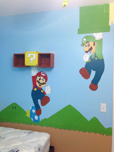 Mario themed kids room. Question mark shelf opens for a special hiding spot. Mario Art Painting, Super Mario Kids Room, Mario Room Ideas, Super Mario Room Decor, Super Mario Bedroom Ideas, Mario Bedroom Ideas Boys, Mario Themed Bedroom, Mario Room Decor, Mario Mural