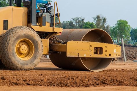 Premium Photo | Vibratory roller compactor working on new road construction site Road Workers, Under Bridge, Concrete Truck, Road Roller, German People, Mix Concrete, Road Transport, Road Construction, Crushed Stone