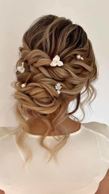 JESSICA KEIFE-OC bridal hair on Instagram: "When people ask me my favorite hairstyle to create.. my signature updo is way up there! I just love how romantic and timeless this bridal updo is!  . We completed the look with The Edelweiss Pins from my collection @jaykaybraidsandbridal 🤍✨ These gorgeous Bridal hair pins are tagged and are available for purchase!  Or comment “PINS” & I’ll dm you a direct link!" Bridal Hairstyles Thick Hair, Hair Updos Bride, Romantic Low Updo Wedding, Edelweiss Hair Pin, Up Do For Wedding Bridesmaid, Wedding Bride Updo Hair, Wedding Updo Pearls, Windy Wedding Hair, Wedding Hair Asian Brides