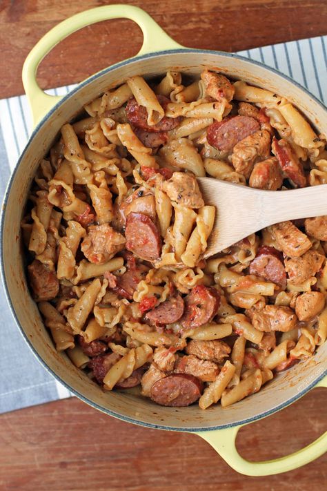 This tasty lightened up One-Pot Cajun Chicken and Sausage Pasta is full of smoky flavor and just 366 calories or 8 Green 8 Blue or 4 Purple WW SmartPoints! Cajun Chicken And Sausage Pasta, Chicken And Sausage Pasta, Ww 2023, Cajun Chicken And Sausage, Ww Dinner, Emily Bites, Garlic Chicken Pasta, Neufchatel Cheese, Chicken And Sausage