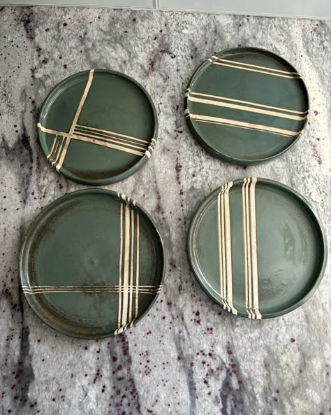 Take home a single plate or take home the entire set. They are all roughly 7 inches in diameter. Handthrown with stoneware clay and glazed in "Seaworld". Each plate has a different line pattern created with tape resist. This also creates a texture difference so you can feel both the smooth glaze finish and the slight roughness of raw ceramic. Hand Built Ceramic Plates, Handmade Pottery Plates, Coasters Ceramic, Restaurant Plates, Clay Patterns, Clay Box, Pottery Inspo, Clay Plates, Coaster Art