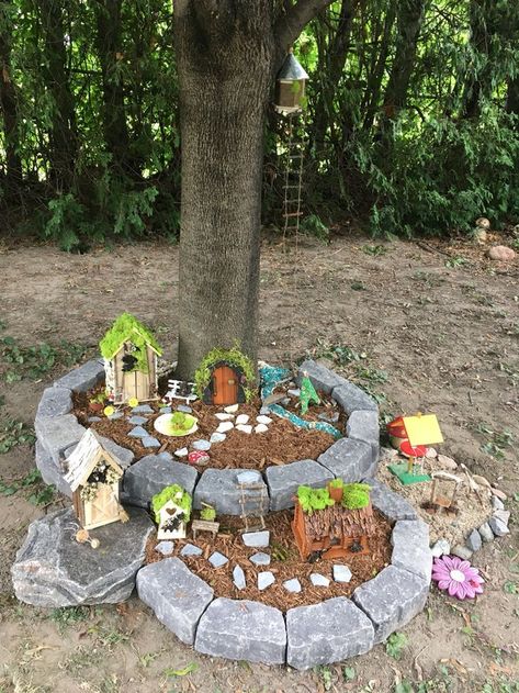 Fairy Garden Stone House Diy, Fairy Front Yard, Fairy Garden Ideas Around Tree, Tree Area Ideas, Large Garden Ideas Landscaping Backyards, Fairy Garden In Backyard, Fairy And Gnome Gardens, Fairy Garden Tree House, Fairy Garden Around A Tree