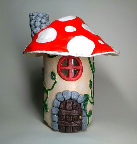 Mini mushroom house made using a jar, air dry clay and acrylic paint Clay Mushroom House, Pal Tiya, Mushroom Jar, Bottle Paint, Clay Mushroom, Mini Mushroom, Clay Jar, Mushroom House, Painted Jars