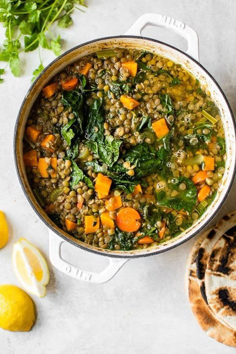 Make a big pot of this healthy, vegetarian (and vegan) Lebanese Lentil Soup, made with green lentils, kale, sweet potato, ginger and lots of garlic and lemon. #lentilsoup #lentils #pantryrecipes Lebanese Soup Recipes, Kale Lentil Soup, Soup Skinnytaste, Lentil Vegan, Vegan Lebanese, Green Lentil Soup, Lebanese Lentil Soup, Kale Sweet Potato, Vegetarian Lentil Soup