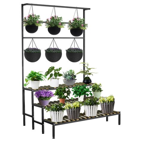 PRICES MAY VARY. 🌿【Combination of metal and wood】This 3-tier hanging plant stand is combined with pine wood and painted iron frame, giving full play to the strength of the two materials, heat-resistant, weatherproof, moisture-proof, non-shrinking, non-warping, and non-cracking. The wood has been carbonized at high temperature, supported by a strong iron frame, super strong and durable. 🌱【Give Your Planters More Storage Space】Plant stand size: 39.3"L x 28.3"Wx 60"H. This large plant ladder shel Plant Rack Outdoor Metal, Plant Shelf Indoor, Flower Ladder, Plant Shelves Outdoor, Black Metal Plant Stand, Metal Plant Stand Wrought Iron, Hanging Plant Stand, 5 Tier Wrought Iron Plant Stand, 4 Tier Metal Plant Stand