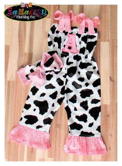 Girls Cow Pants / Cow Romper Baby Girl / Cow Print Outfit / Cow Birthday Romper / Farm Theme Birthday / Girl Farm Outfit Zamakerr Clothing Co. presents this adorable Girl COW LIGHT PINK GINGHAM ROMPER / ALL IN ONE Available Sizes - newborn through size 8 Ordering up a size is not suggested. Outfits are very true to size with a little more room for growth. If concerned about sizing, please let us know after checkout and the necessary measurements will be requested. Thanks for shopping with us! Cow Print Birthday Outfit, First Barnyard Birthday, Little Cowgirl Outfit Kids Girl, Pink Farm First Birthday, First Rodeo Birthday Party Girl Outfit, Pink Cow 1st Birthday, Farm Birthday Party Outfit, My First Rodeo Birthday Girl Outfit, Cow Print 1st Birthday Girl