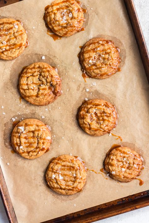 This Crispy Salted Caramel Cookies recipe combines homemade caramel with a perfect balance of salty and sweet flavors in these decadent cookies. Each bite boasts a crunchy exterior and a soft, chewy center, elevating this cookie to irresistible heights. Salty Caramel Cookies, Salted Caramel Cookies Recipe, Caramel Cookies Recipes, Decadent Cookies, Salted Caramel Cookies, Crispy Cookies, Salted Caramel Sauce, Caramel Cookies, Homemade Caramel