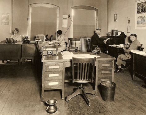 Typical floor companions in offices of the 1920s were waste baskets and spittoons, as seen in this photograph taken in 1929. Photo via Early Office Museum. 1920s Office, Frederick Taylor, Detective Office, Moodboard Portfolio, Thoroughly Modern Millie, Antique Office, Adding Machine, Modern Millie, Medical Examiner