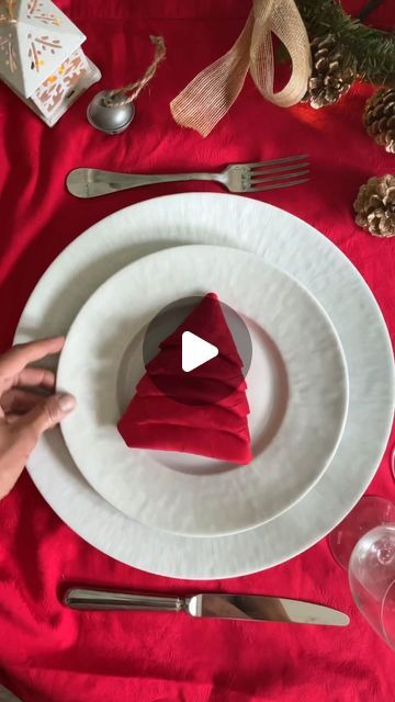 Manuela Mazzocco on Instagram: "✨Christmas Tree Napkin Fold✨ One more way to showcase the magic of the season❤️ This simple yet enchanting fold can add a sprinkle of joy to your holiday celebrations😘 Merry Christmas 🎄  #napkinfold #tutorial #howto #napkin #tabledecor #holidaytable" Fold Napkin Like Christmas Tree, Napkin Folding For Christmas, Folding Napkins For Christmas, Christmas Napkin Folding Tutorials, Tree Napkin Fold, Christmas Tree Napkin Fold, Napkin Folding Tutorial, Christmas Tree Napkin, Christmas Napkin Folding