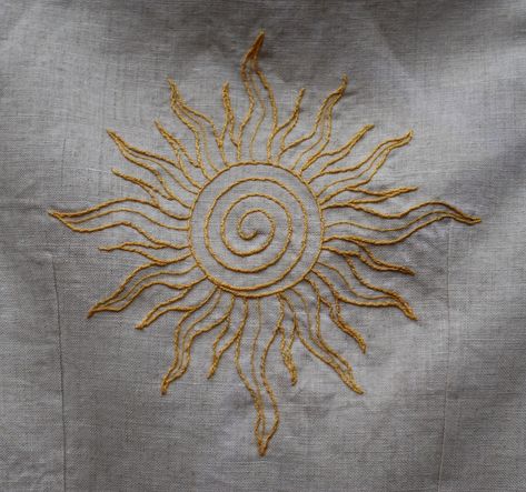 This is the back of our last “Alma” top. Don’t you love the sun? 🌞 Now available on our website! #sunembroidery #pastranadepastrana #handsewnclothing #handembroidery #linenclothing #embroideredtop #yellowembroidery Greek God Embroidery, Sun Moon Embroidery, Sun Embroidery Design, Sun Embroidery Pattern, Rapunzel Sun, Sun Embroidery, Embroidered Sun, Medieval Tapestry, Pearl Embroidery