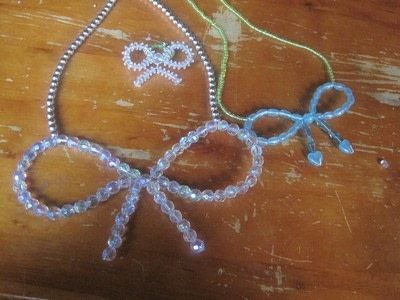 How To Make A Sweet Lolita/Bow Necklace. · How To Make A Beaded Necklace Bow Necklace Diy, Seed Bead Bow, Make A Beaded Necklace, Beaded Bow, Tie Necklace, Necklace Beads, Necklace Tutorial, Bead Ideas, Necklace Patterns