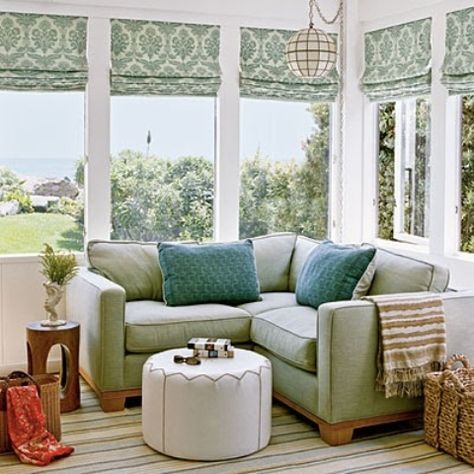 a refreshing sunroom nook with green shades and furniture, comfy ottomans and colorful touches Small Corner Couch, Small Sunroom, Small Sectional, Small Sectional Sofa, Sunroom Furniture, Corner Seating, Cottage Room, Small Couch, Sunroom Decorating