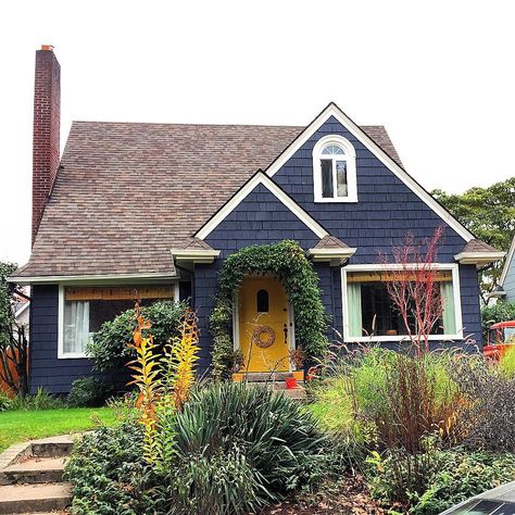 Navy blue cottage cutie is a favorite 💙  #navyblue #navybluehouse #navybluehome #cottagestyle #cottagestylehouse #cottagehome #cottagecutie… Navy Cottage Exterior, Homes With Character Exterior, Blue Craftsman House Exterior, Bohemian Exterior House, Navy Home Exterior, Navy Blue Exterior House, Unique House Colors Exterior, Blue Cottage Exterior, Blue Houses Exterior