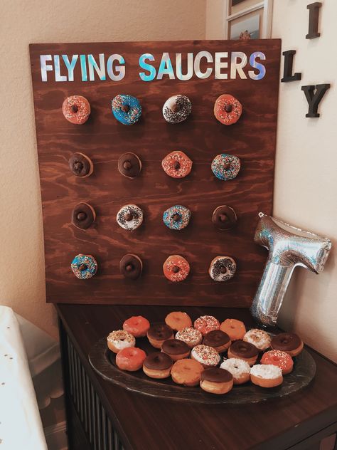 Space themed donut wall~ #donuts #donutwall #space #firsttriparoundthesun #birthday #firstbirthday #diy 3 2 1 Blastoff Birthday, Outer Space First Birthday Party Food, Two Space Birthday Party, Donut Space Theme, Space Themed Fourth Birthday, Space Themed 30th Birthday, Astronaut Birthday Party Food, Diy Space Theme Decor, Space Themed Breakfast