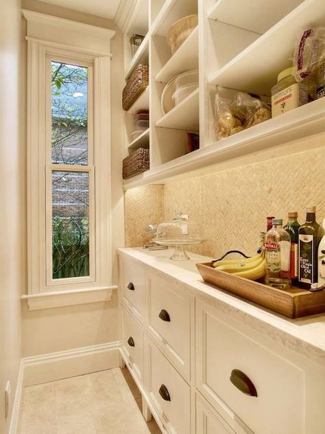 Long, narrow butler's pantry features open shelving over white shaker cabinets accented with oil-rubbed bronze pulls topped with white marble and paired with herringbone backsplash. Pantry Laundry Room Combo, Narrow Pantry, Pantry Inspiration, House Pantry, Transitional Kitchen Design, Pantry Laundry Room, Pantry Laundry, Pantry Room, Butler’s Pantry