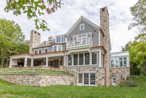 Shingle colonial style lake house with breathtaking details in Minnesota Turtle Lake, Beadboard Wainscoting, Brick Pathway, Stone Chimney, Blue Shutters, Exterior Inspiration, Colonial Style Homes, Outdoor Stone, Tudor House