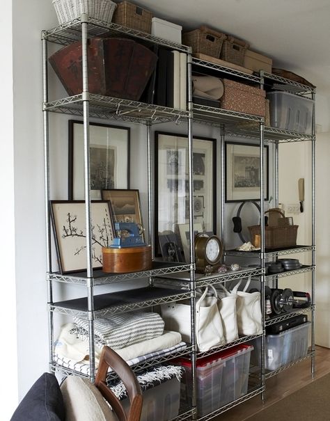 This is what i need for my spare bedroom/gear storage. Love how the made the eye level shelf more decorative. Takes you eye away frm the bins etc. Small Shelving Unit, Metro Shelving, Commercial Shelving, How To Make Metal, Metal Shelving, Wire Shelving Units, Pantry Wall, Wire Racks, غرفة ملابس