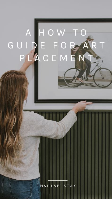 How high to hang artwork, how to style gallery walls, what size artwork should you use...Art size and placement guide by Nadine Stay | Hunter green wood slat wainscoting with bicycle oil painting #artguide #vintageart #artplacement #artips #interiordesigntips #designertips #stylingtips Hanging Art Above Wainscoting, Height To Hang Artwork, How To Hang Art Over Wainscoting, Wall Art Tips, Wall Art Placement Living Rooms, Bedroom Art Placement, Painting Sizes On Wall Guide, Hanging Prints On Wall, Gallery Wall Wainscotting