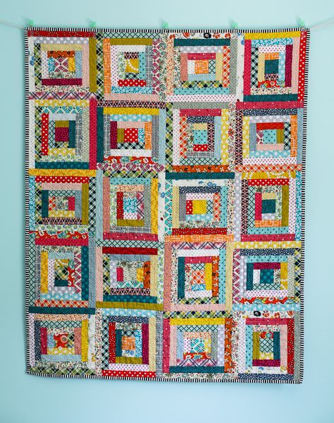 Love this scrap-happy Log Cabin baby quilt! That striped binding really ties it together. From Audrie Bidwell via the Blue is Bleu blog. White Log Cabin, Scrappy Log Cabin, Log Cabin Quilt Pattern, Log Cabin Quilt Blocks, Scrappy Quilt Patterns, String Quilts, Log Cabin Quilts, Scrap Quilt, Log Cabin Quilt