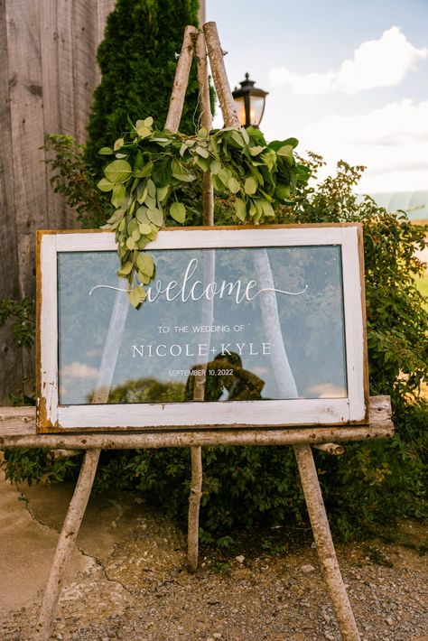 A vintage window as a welcome sign for a barn wedding. Photo by Cindy Lottes Photography Wedding Signs Old Windows, Old Window Signs Wedding, Window Signs For Wedding, Farm Wedding Signs, Vintage Frame Wedding Decor, Diy Wedding Frame Sign, Glass Window Wedding Signs, Diy Window Wedding Decor, Wedding Welcome Sign Window