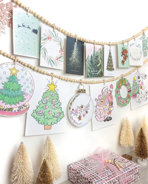 14 of the Best Christmas Decorations for 2022 and Beyond Christmas Photo Display, Picture Garland, Hanging Christmas Cards, Holiday Card Display, Picture Collages, Sustainable Gift Wrap, Christmas Card Holder, Christmas Card Display, Art Display Kids