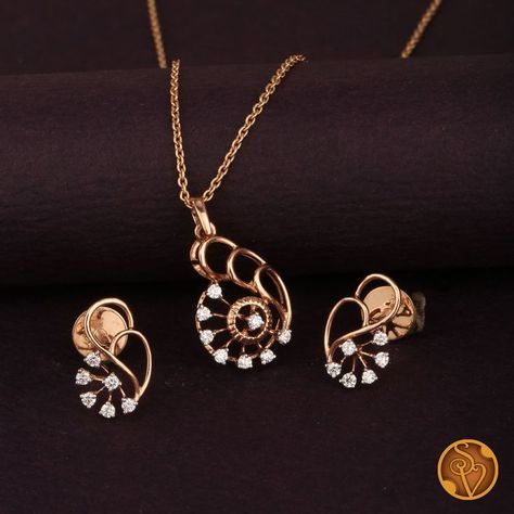 The elegant appearance of this 18kt Rose gold pendant Set is studded with diamonds stones.

Note: The given price is only for the pendant and Earrings, it does not include the Chain. Rose Gold Pendant Set, Indian Gold Necklace Designs, Gold Pendant Set, Real Diamond Earrings, Simple Gold Earrings, Bride Jewelry Set, Diamond Pendent, Diamond Pendants Designs, Diamond Earrings Design