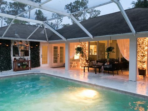 Blank patio turned plant-filled retreat | House Mix Pool Screen Lighting Ideas, Florida Pool Ideas With Cages, Florida Patio Ideas Screened Pool, Pool Lanai Lighting Ideas, Pool Cage Decor Ideas, Screened In Pool House, Back Porch Pool Ideas, Indoor Pool Decorating Ideas, Screened Pool Patio Ideas Decor