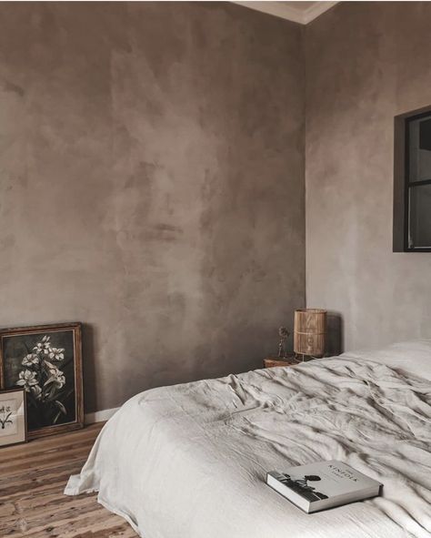 Dark Limewash Walls Bedroom, Dark Lime Wash Bedroom, Concrete Accent Wall Bedroom, Moody Limewash Bedroom, Brown Limewash Bedroom, Limewash Walls Interiors Bedroom, Dark Limewash Bedroom, Cement Wall Bedroom, Limewash Accent Wall Bedroom