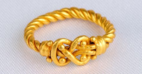 The Hercules Knot Ring. Ꜹ, 3.8 g, circa 1st century AD. This beautifully intricate ring is called a knot of Hercules or marriage knot. It is a strong knot created by two intertwined ropes of gold. It originated as a healing charm in ancient Egypt, however is it best known from Greece and Rome as a protective amulet, most notably as a wedding symbol. Extremely fine. Measures: 1.5 ring size. $750. Hercules Knot Ring, Heracles Knot Ring, Heracles Knot, Hercules Knot, Protective Amulet, Reef Knot, Byzantine Gold, Wedding Symbols, Strong Knots