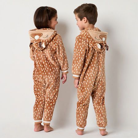 Your toddler will feel festive and fun for the holidays thanks to this unisex reindeer pajama one-piece by North Pole Trading Co. Crafted from super soft fleece, this hooded one-piece has cuffed sleeves and a full zip closure. Get the matching socks and sets for the whole family to enjoy. Closure Type: ZipperSleeve Length: Long SleeveSleeve Style: Cuffed SleeveApparel Length: 21.5 InchesFiber Content: 100% PolyesterFabric Description: FleeceInseam: 12 3/4 InCare: Machine Wash, Tumble DryCountry… Reindeer Pajamas, Matching Socks, One Piece Pajamas, Family First, North Pole, Cuff Sleeves, Pajamas, Holidays, One Piece