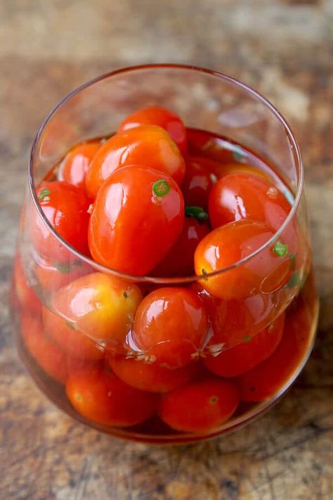 Who knew you could pickle cherry tomatoes and make them taste so good! Last week Ben came home with a bag full of Thai goodies after shopping at Bangkok Center Grocery in Chinatown. It’s by far the best place to go to in Manhattan for authentic Thai ingredients, plus the staff is so helpful and nice! I usually get … Pickled Cherry Tomatoes Recipe, Pickled Cherry Tomatoes, Pickled Vegetables Recipe, Pickled Tomatoes, Pickled Cherries, Cherry Tomato Recipes, Easy Asian Recipes, Homemade Pickles, Pickled Veggies