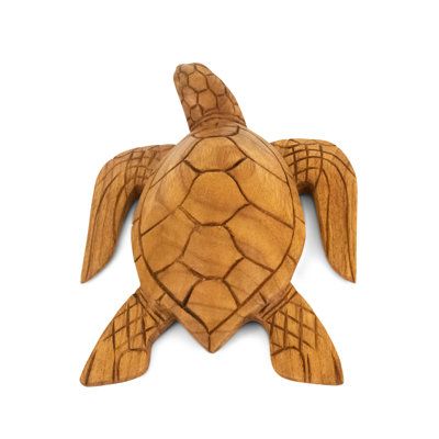 No matter how strong the currents, just keep swimming. Be reminded of your resilience by this wooden sea turtle decoration! Perfect as a shelf ornament, table decoration or desk accessory, the hand-carved turtle sculpture is complementary to home or office décor with a coastal aesthetic. Rest the handmade tortoise carving on any flat surface. Size: 3.50" H x 7" W x 9.50" D | Bay Isle Home™ Aalaya Handmade Animals Figurine / Sculpture 3.5 H x 7.0 W x 9.5 D in / grayWood in Brown | 3.50" H x 7" W Tortoise Home, Carved Turtle, Tortoise House, Turtle Sculpture, Turtle Decor, Just Keep Swimming, Home Decor Sculptures, Coastal Aesthetic, Keep Swimming