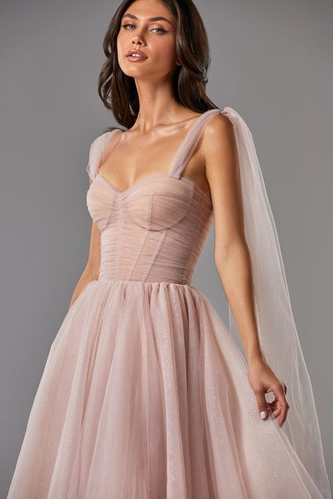 This elegant off-the-shoulder cocktail gown is made of delicate tulle fabric and covered by dozens of silver sparks—the dress traps decorated with elegant bows, which highlight the effortless, feminine vibe of the dress. The build-in corset accentuates the hourglass silhouette, and the lacing makes this dress suitable for each body type. A sparkly off-the-shoulder tulle dress is the perfect choice for cocktail dress code parties, and it will definitely make you the queen of the party. Available Vestido Rose Gold, Off Shoulder Tulle Dress, Homecoming Dresses Corset, Gown Cocktail, Dress Graduation, Misty Rose, Cocktail Gowns, Gauze Dress, Solid Color Dress