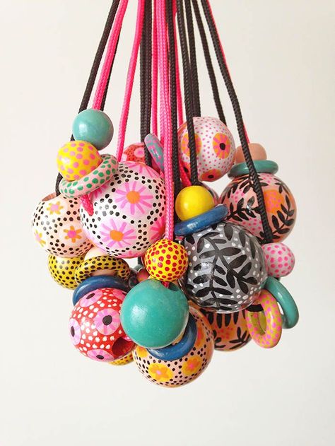 Hand painted bead necklaces by Amy Blackwell, available at www.audreyandillya.com Painted Wooden Beads Diy, Hand Painted Wooden Beads, Painted Beads Wooden, Painted Wood Beads, Wood Beads Diy, Painted Beads, Hand Painted Beads, Diy Collier, Wooden Bead Necklaces