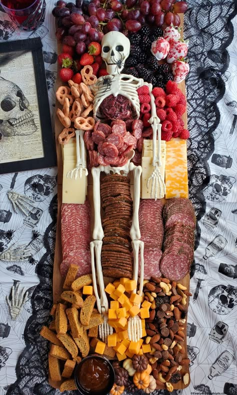 Skeleton Charcuterie Board - Everyday Shortcuts Halloween Shareables, Filling Charcuterie Board Ideas, Meat Skeleton Halloween, Aldi Halloween Charcuterie Board, Skeleton Charcuterie Board Ideas, Skeleton Cheeseboard, Halloween Charcuterie Board For Adults, Hand Charcuterie Board, Day Of The Dead Charcuterie Board