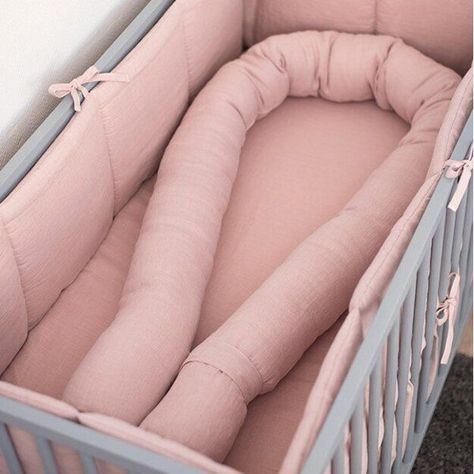 These crib bumpers are available in different colors, and they are filled with paddings, and the outer is made from highest quality, soft and cozy 100% linen fabric. The baby nursery crib bumpers are designed and decorated with ties to add the additional charm. #cribbumper #nursery #nurserydecor #cotdecor #babysafety Crib Bumper Ideas, Crib Bumper Tutorial, Crib Bumper Pads, Wooden Clothes Rack, Oval Crib, Baby Cot Bumper, Snake Pillow, Nordic Nursery, Crib Liners