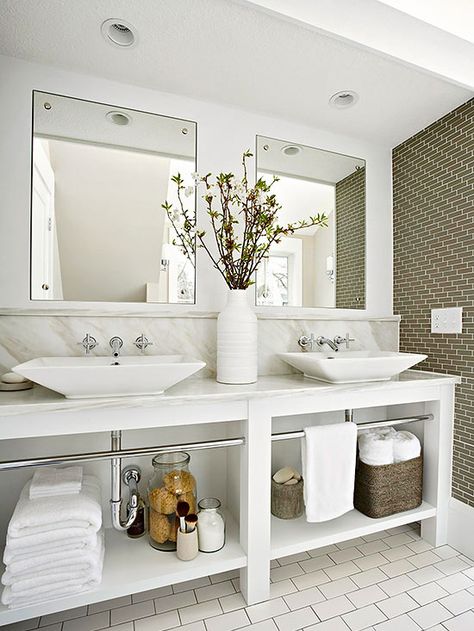 Combining the traditional look of marble with the modern vessel sink offers an up-to-date yet timeless design aesthetic. Open storage under ... Small Farmhouse Bathroom, Ideas Baños, Farmhouse Bathroom Design, Herringbone Backsplash, Vanity Design, Small Farmhouse, Double Sink Vanity, Vessel Sink Bathroom, Bathroom Renos