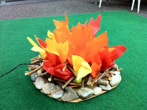 What camping theme would be complete without a fake fire for the classroom? This one is made from rocks, twigs and tissue that I think could stand up to the classroom test. Nc Camping, Fake Campfire, Camp Read, Camping Classroom, Camping Theme Classroom, Camping Decor, Camping Party, Camping Theme, Vacation Bible School