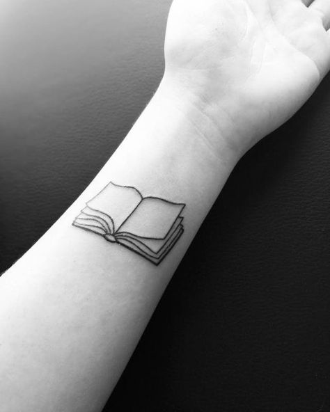 Bookmark this to discover 40 small tattoo ideas to copy when you're wanting to get fresh ink. Bookmark Tattoo, Small Book Tattoo, Open Book Tattoo, Writer Tattoo, Book Tattoo Ideas, Bookish Tattoos, Petit Tattoo, Literary Tattoos, Muster Tattoos