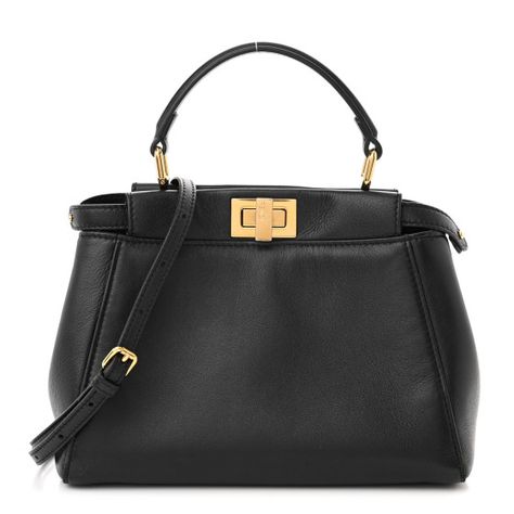 This is an authentic FENDI Nappa Mini Peekaboo Iconic Satchel in Black. This stylish handbag is crafted of soft nappa lambskin leather in black. It features a leather top handle, an optional crossbody strap, and gold Fendi logo turn locks. This opens to a partitioned black leather interior with patch and zipper pockets. Fendi Peekaboo Mini, Fendi Peekaboo Bag, Pokemon Fabric, Fendi Peekaboo, Fendi Logo, Python Print, Shopper Tote, Fendi Bags, Fall 2024