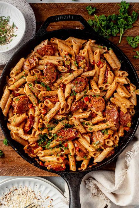 This cajun sausage pasta has a bold and spicy flavor profile and is full of vibrant colors. The noodles and smoky andouille sausage are coated in a rich and creamy Cajun-inspired sauce.