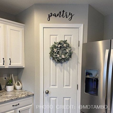 🌿I love this beautiful white kitchen with the greenery added in for a pop of color♥. This gorgeous kitchen is also showcasing our metal “PANTRY” sign. #pantry #pantrydecor #pantrydesign #kitchen #kitchendecor #whitekitchen #whitecabinets #metal #metaldecor #customerphotos #weloveourcustomers #home #homedecor #shoplocal #supportsmallbusinesses #supportlocalbusiness #shopsimplyinspiredco #simplyinspiredco Pantry Door Decor, Beautiful White Kitchens, Pantry Decor, Pantry Sign, Above Kitchen Cabinets, Modern Metal Wall Art, Kitchen Cabinets Decor, Wall Art Metal, Gorgeous Kitchens