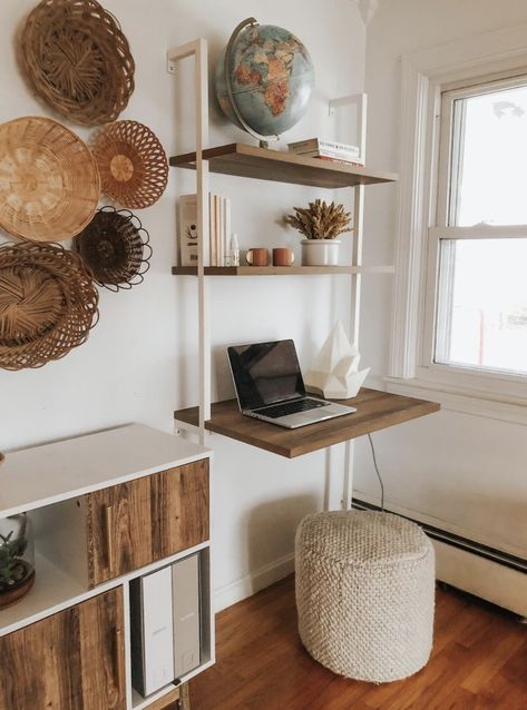 Or a wall-mounted desk that doubles as a bookshelf if space is so limited that your only option is vertical. Since it mounts to the wall, it'll be extra sturdy. Office Wall Shelf Ideas Desk Space, Apartment Desk, Small Room Desk, Desk Nook, Tiny Home Office, Desks For Small Spaces, Wall Mounted Desk, Shelf Desk, Desk In Living Room