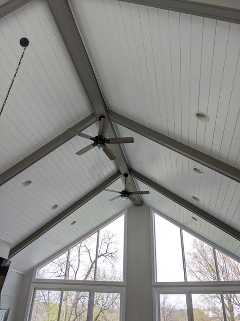 Vaulted ceilings. White shiplap ceilings. Grey wood beams Grey Beams Ceilings, White Ceiling Black Beams, Grey Ceiling Beams, Shiplap Ceiling Vaulted, Shiplap Ceiling With Beams, White Shiplap Ceiling, Wood Beams On Ceiling, Log Playground, Sunroom Ceiling